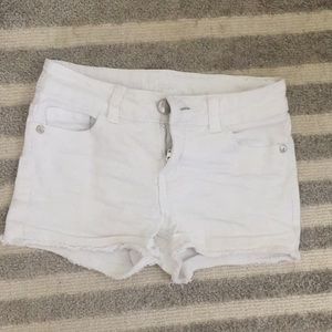 Super cute white denim shorts.
